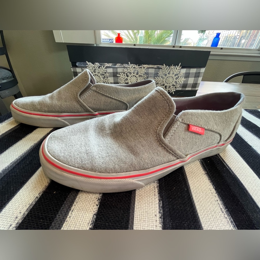 Light grey with hot pink trim Vans.